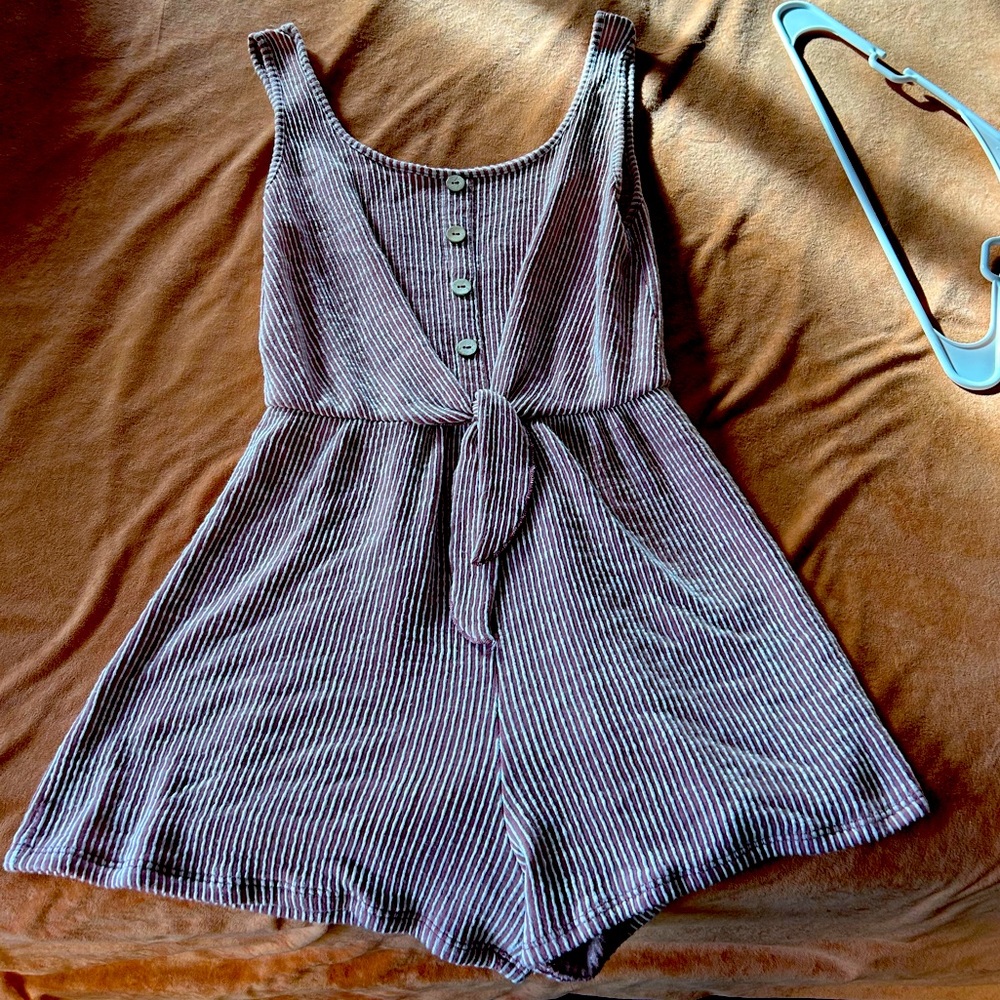 Vintage pink and white romper, size small-med. Great condition, no stains.